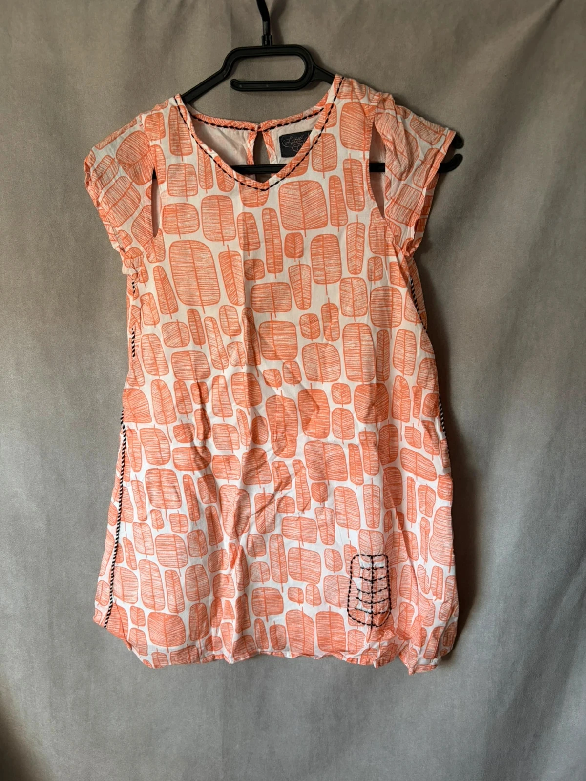 Robe 10 ans orange et blanche